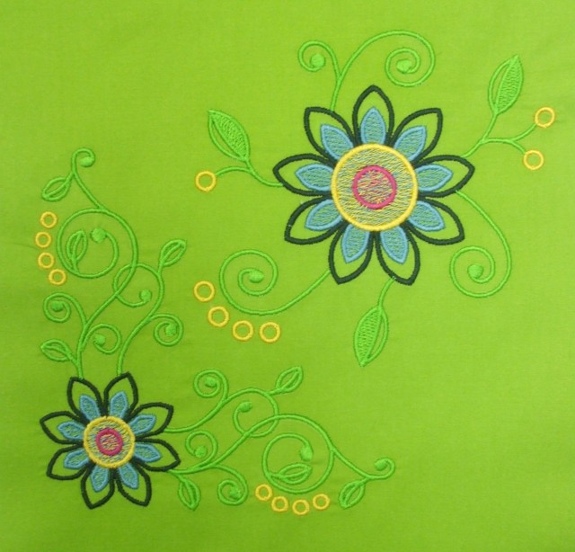 CORNER FLOWER SWIRL AND ANOTHER FLOWER SWIRL - you have see this satin stitch digitizing to believe how fine it is!